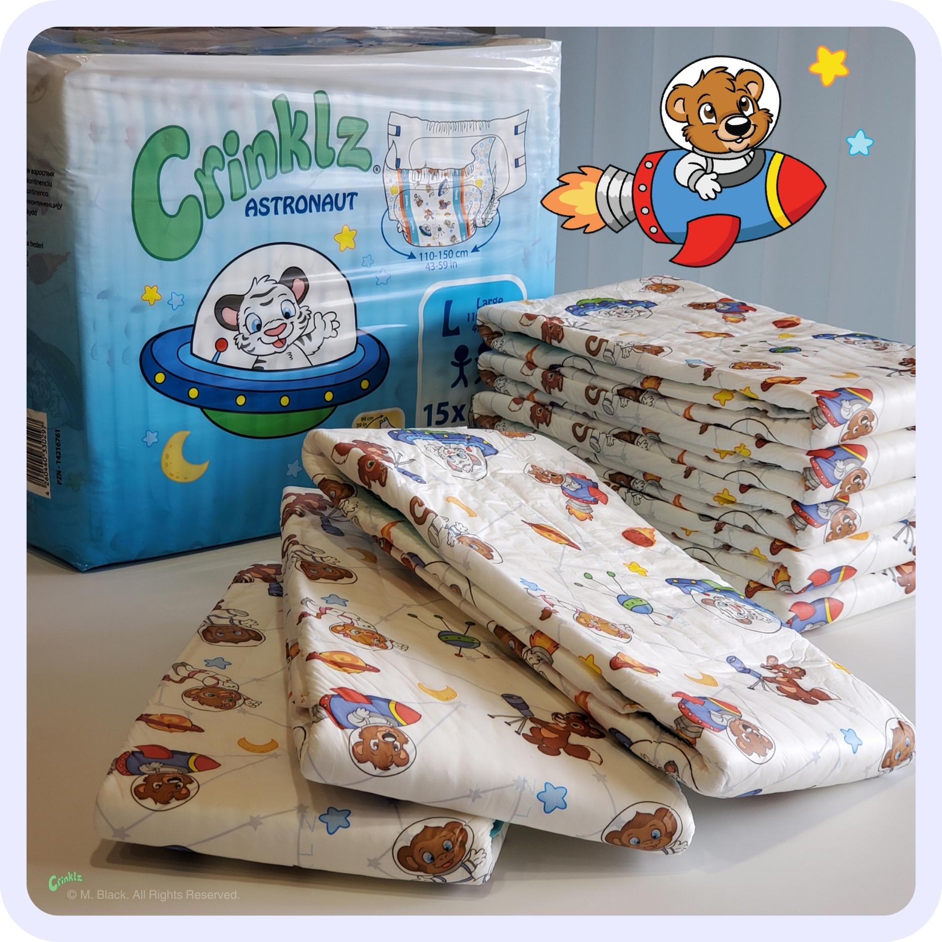Stack of Crinklz Astronaut adult diapers in front of polybag.
