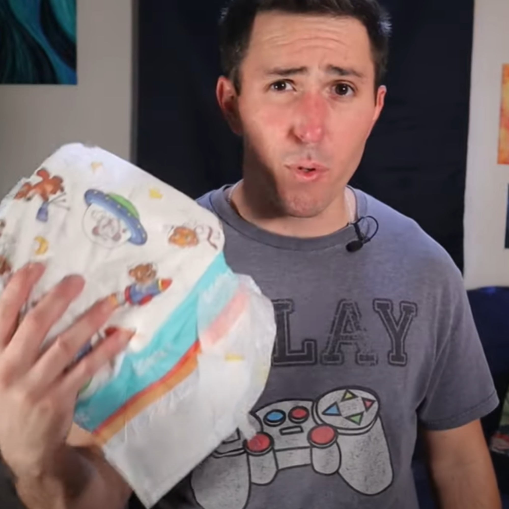 Still from a YouTube channel review from Diaper Dynamo of Crinklz adult diapers.