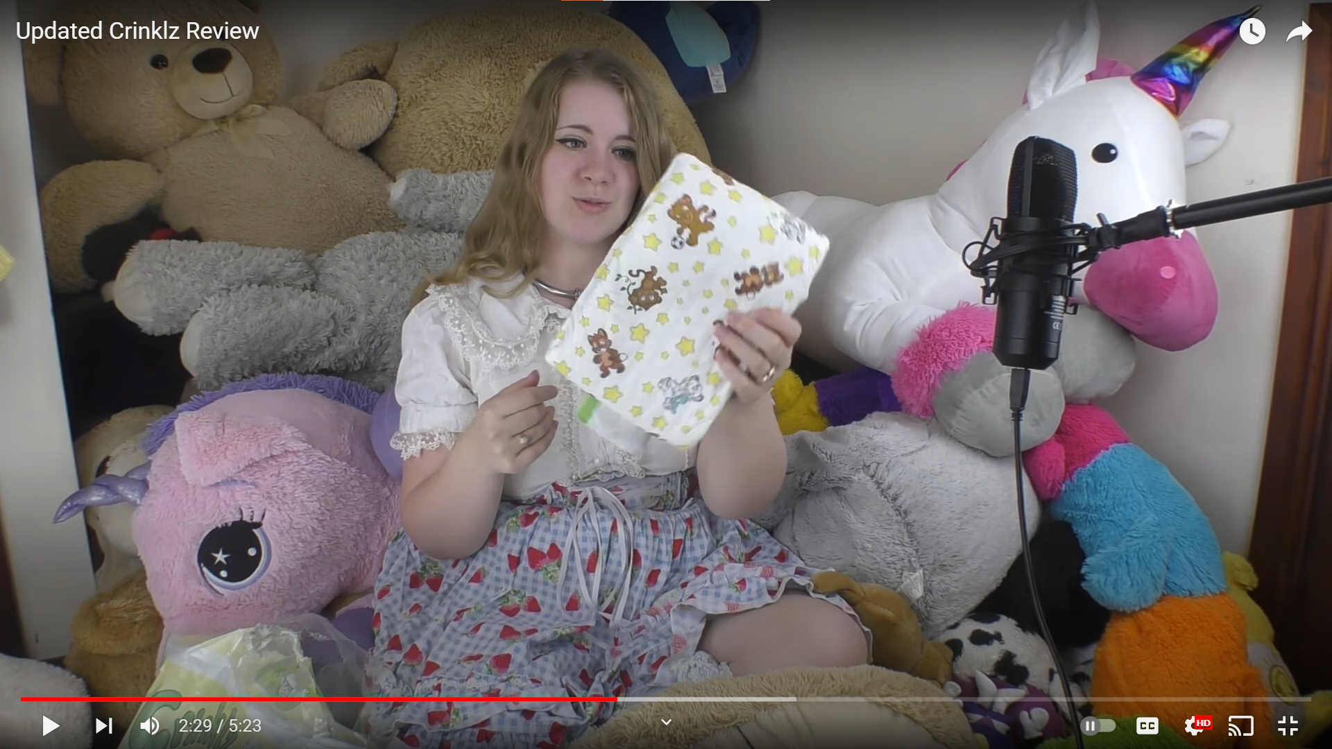 Screen capture of Lollicat reviewing Crinklz Original adult diaper on her YouTube channel.